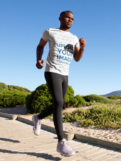 T-Shirt Mockup of an Athlete Running on a Sandy Track 38926-r-el2