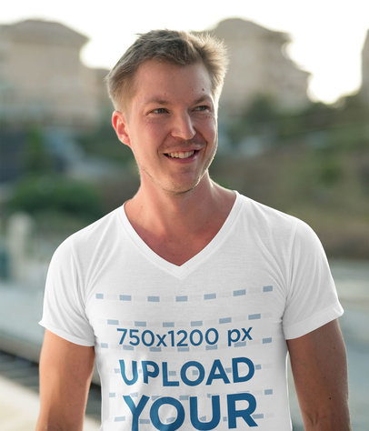 Mockup of a Happy Man Wearing a V-Neck T-Shirt