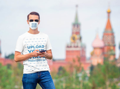 Mockup of a Man Wearing a T-Shirt and a Face Mask