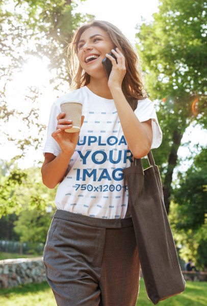 T-Shirt Mockup of a Young Woman with a Nose Piercing Talking on the Phone