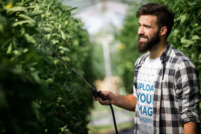 T-Shirt Mockup of a Man Taking Care of His Garden