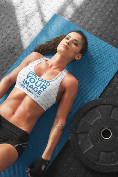 Sublimated Sports Bra Mockup Featuring a Woman Resting on the Floor 34862-r-el2