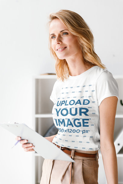 Mockup of a Middle-Aged Woman with a Simple Tee Taking Notes 