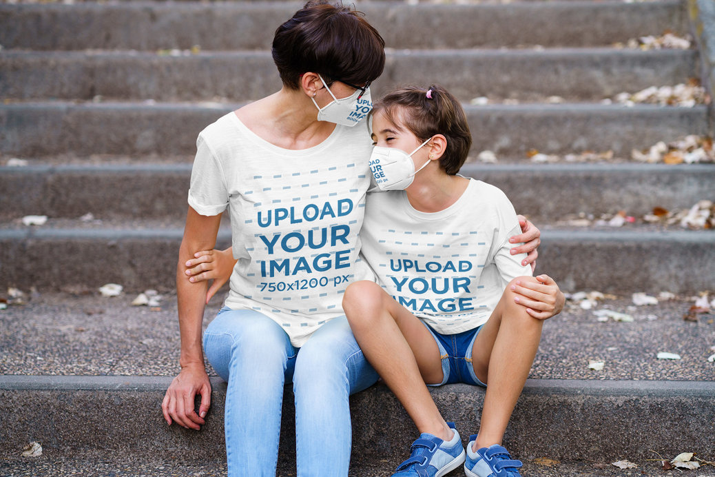T-Shirt Mockup Featuring a Girl and Her Mother Wearing Face Masks 