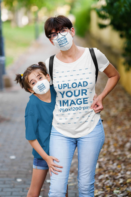 T-Shirt Mockup Featuring a Woman and Her Daughter Wearing Face Masks 