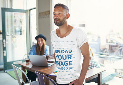 T-Shirt Mockup of a Man in a Casual Workplace 37602-r-el2