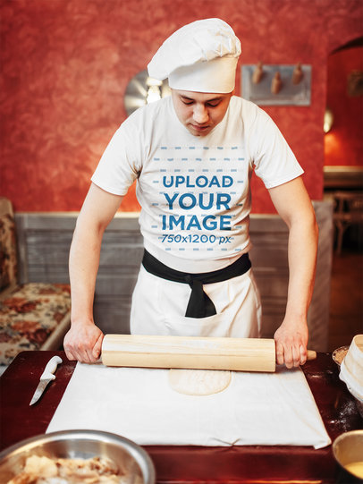 T-Shirt Mockup Featuring a Baker Rolling Out Pizza Dough 