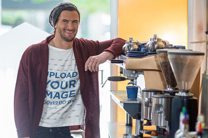 T-shirt Mockup of a Man Posing at a Coffee Shop