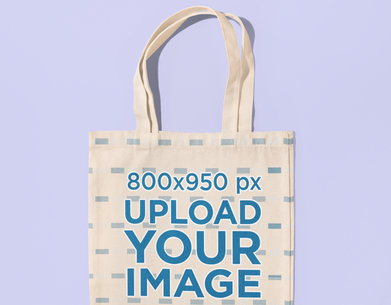 Closeup-View Mockup of a Sublimated Tote Bag on a Customizable Surface 41704-r-el2-