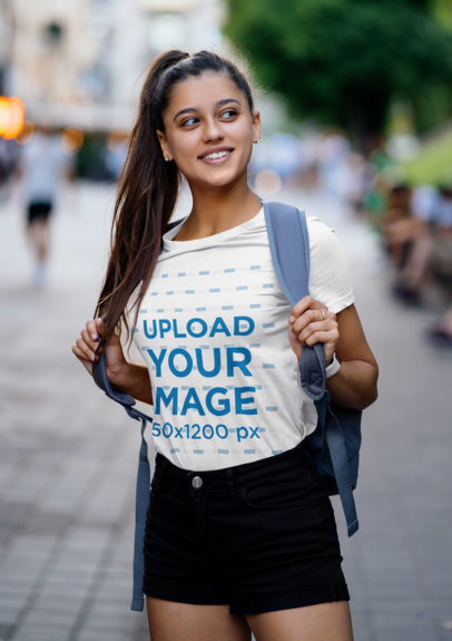 Mockup Featuring a Female College Student Wearing a T-Shirt 