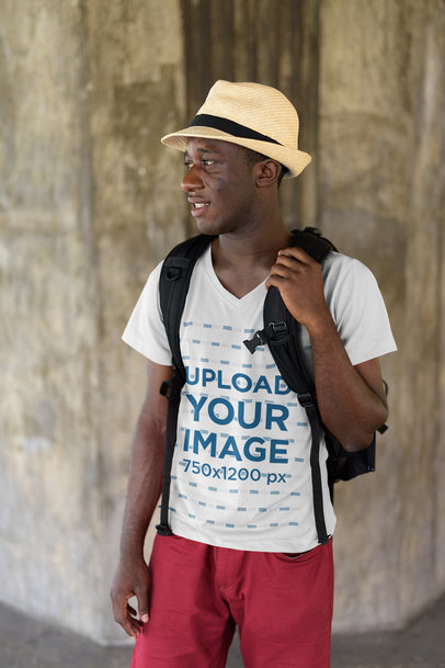 V-Neck Tee Mockup of a Tourist Standing on the Street