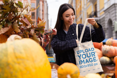 Tote Bag Mockup of a Woman Buying Pumpkins 41754-r-el2
