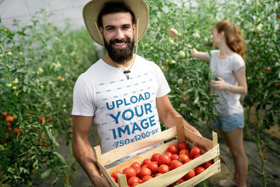 T-Shirt Mockup of a Happy Man Showcasing Some Tomatoes