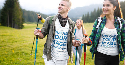 T-Shirt and Tank Top Mockup Featuring Two Friends Hiking in the Mountains
