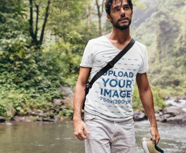 V-Neck T-Shirt Mockup Featuring a Man on a Hike