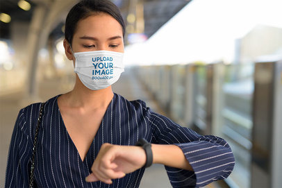 Face Mask Mockup of a Woman Waiting for the Train