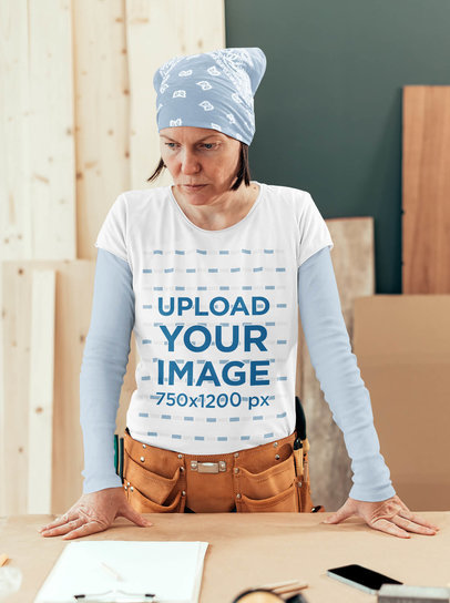 T-Shirt Mockup of a Woman at a Wood Workshop