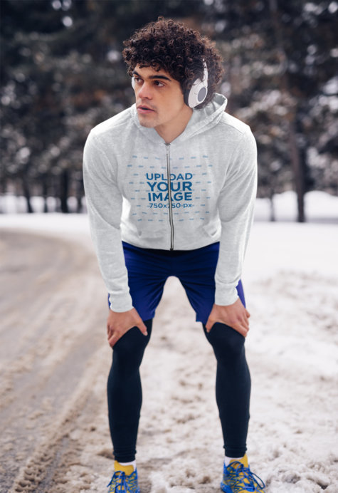 Mockup of a Fit Man Wearing a Heather Full Zip To Go for a Run