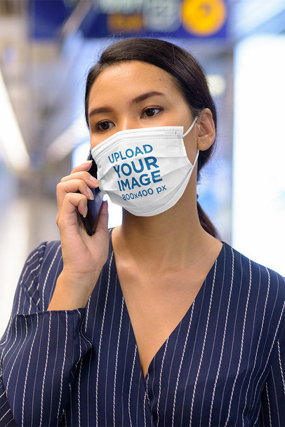 Face Mask Mockup Featuring a Young Woman on the Phone