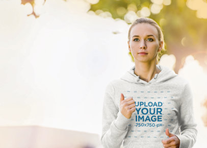 Heathered Hoodie Mockup of a Young Woman Running