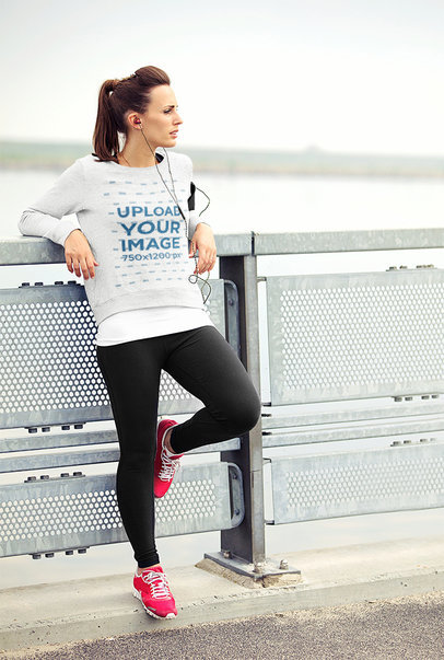 Sweatshirt Mockup Featuring a Female Runner Resting
