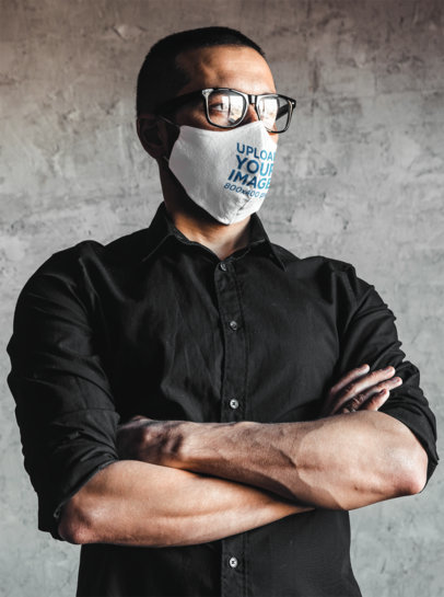 Face Mask Mockup of a Man Posing with His Arms Crossed