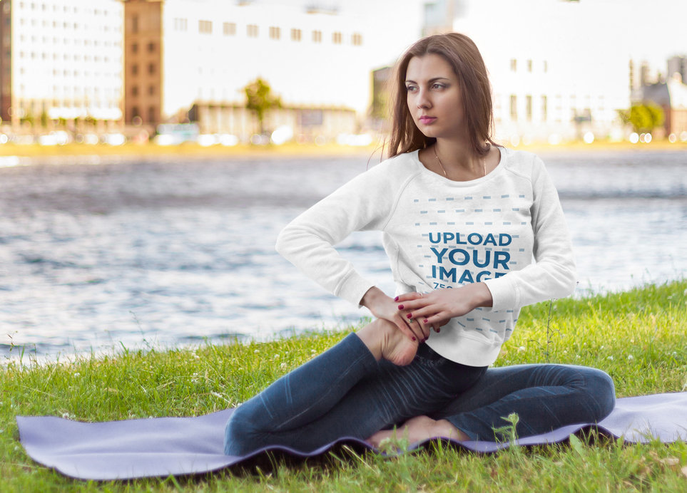 Sweatshirt Mockup of a Woman Doing Yoga by a River