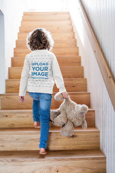 Back View Mockup of a Kids with a Long-Sleeve Tee Carrying a Teddy Bear