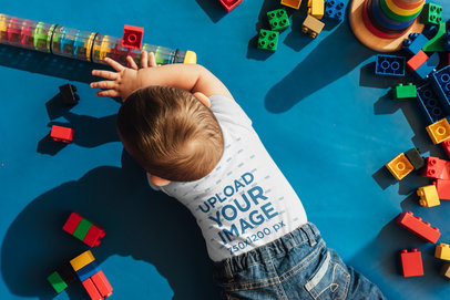 Top Shot Mockup of a Toddler with a T-Shirt Playing in His Room 41899-r-el2
