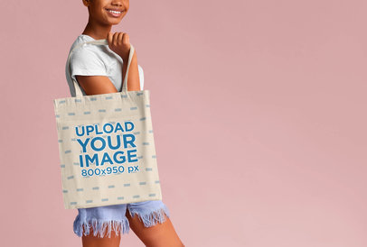 Cropped Face Mockup of a Woman with a Sublimated Tote Bag