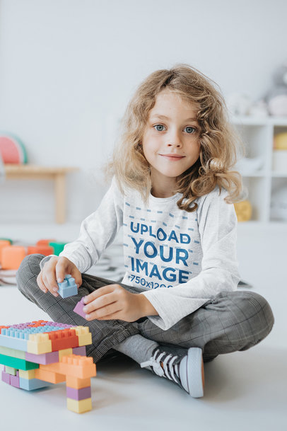 Long Sleeve Tee Mockup of a Long-Haired Kid Playing with Toys 41891-r-el2