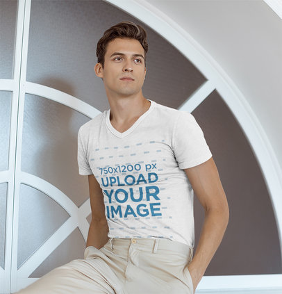V-Neck T-Shirt Mockup Featuring a Young Man Posing