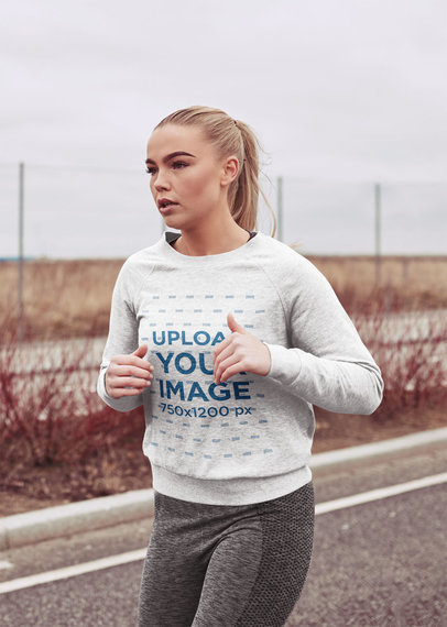 Heather Crewneck Sweatshirt Mockup of a Young Woman Running 