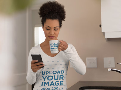 Long-Sleeve Tee Mockup of a Woman Drinking Coffee in an 11 oz Mug 