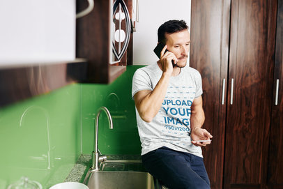 Heather T-Shirt Mockup of a Man Talking on His Phone