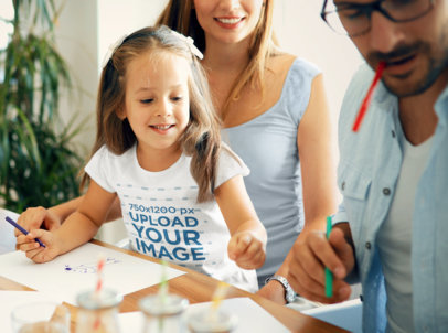 T-Shirt Mockup of a Girl Drawing With Her Parents 
