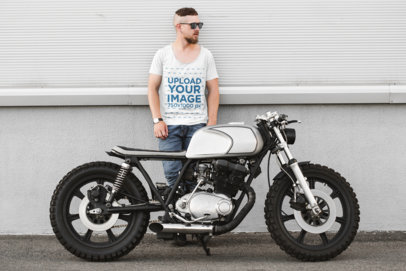 T-Shirt Mockup of a Man Standing Behind a Motorcycle 41676-r-el2