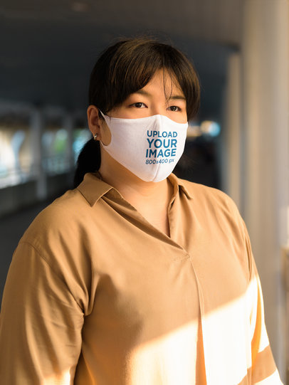 Sublimated Face Mask Mockup of a Woman at a Building Floor