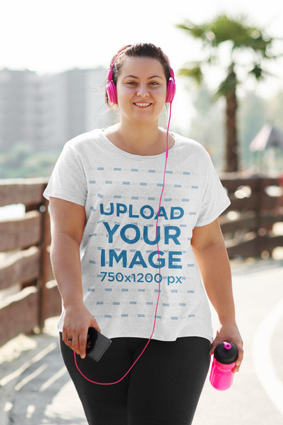 T-Shirt Mockup of a Woman on Her Way to Work Out
