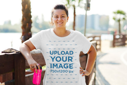 Activewear Mockup Featuring a Happy Woman Wearing a Heather T-Shirt 