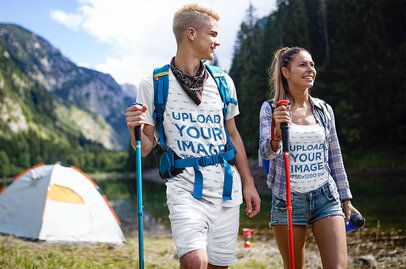 Tee and Tank Top Mockup Featuring Two Friends Hiking in the Alps