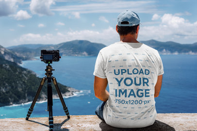 Back-View T-Shirt Mockup of a Man Enjoying the Landscape