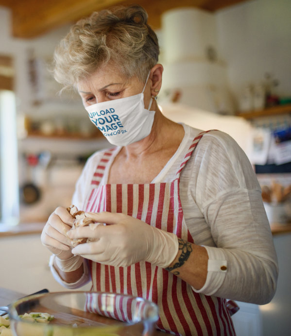 Face Mask Mockup Featuring a Senior Woman in the Kitchen 