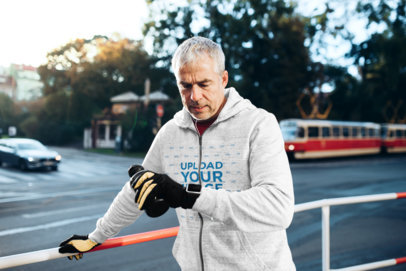 Full-Zip Hoodie Mockup of a Senior Man Working Out