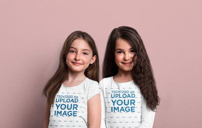 T-Shirt and Long Sleeve Tee Mockup Featuring Two Girls at a Studio 