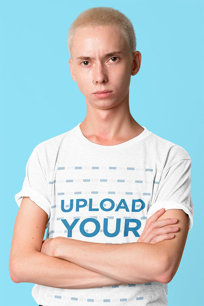 T-Shirt Mockup of a Man with a Straight Face and Crossed Arms