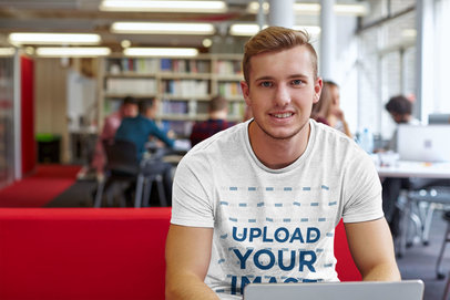 T-Shirt Mockup of a Young Man in a Library