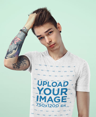 Mockup of a Tattooed Young Man Wearing a Heather V-Neck T-Shirt 