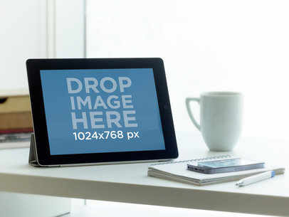 iPad Black Landscape On Desk Next To Window