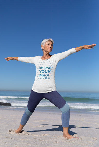 Long Sleeve Tee Mockup of a Senior Woman Doing Yoga by the Beach 41565-r-el2
